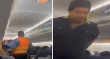 Uçakta silah çekti, ortalık karıştı